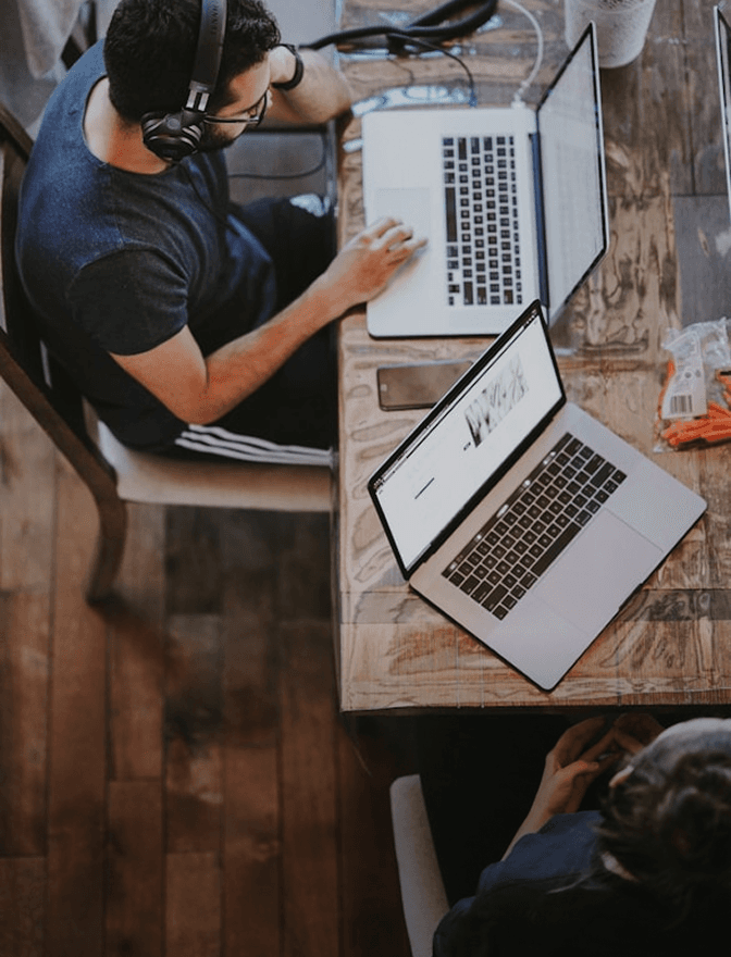 Man With Laptop on the Desk